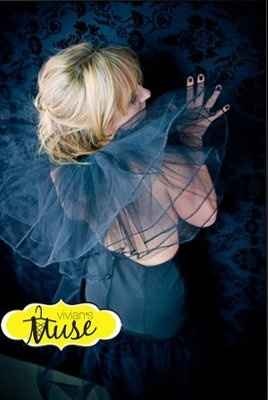 How about some SMEXY photos? (boudoir pics)