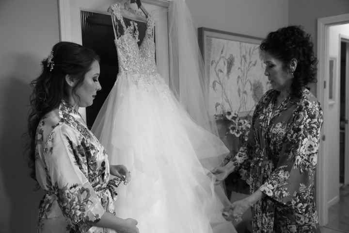 Mom and I looking at my dress