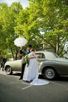 Almost 2 months later and we got our wedding photos.  (Pics included)