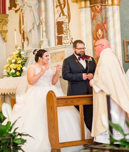 My excitement when my boss(and friend) came over to us..  Catholic Masses don't have to be serious a