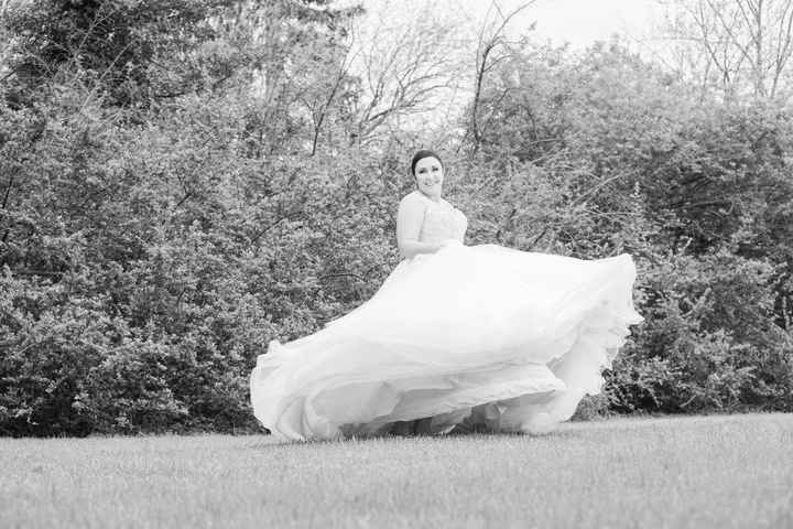 My photographer asked if I could spin.. the dress has 15 layers lol