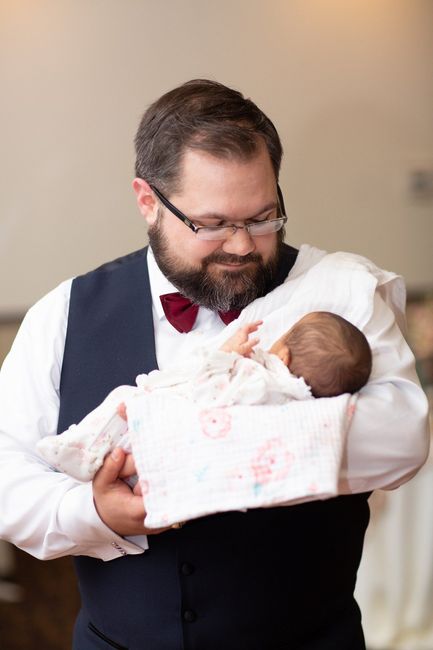 Our friend brought their 1 month old twins.. Hubby holding one of them, talk about questions "When a