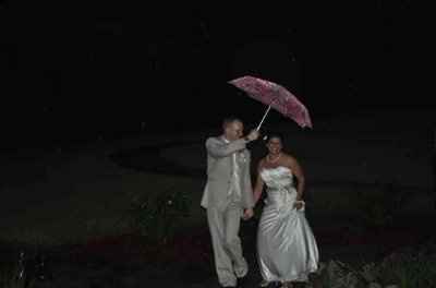 They say rain is good luck on your wedding day!