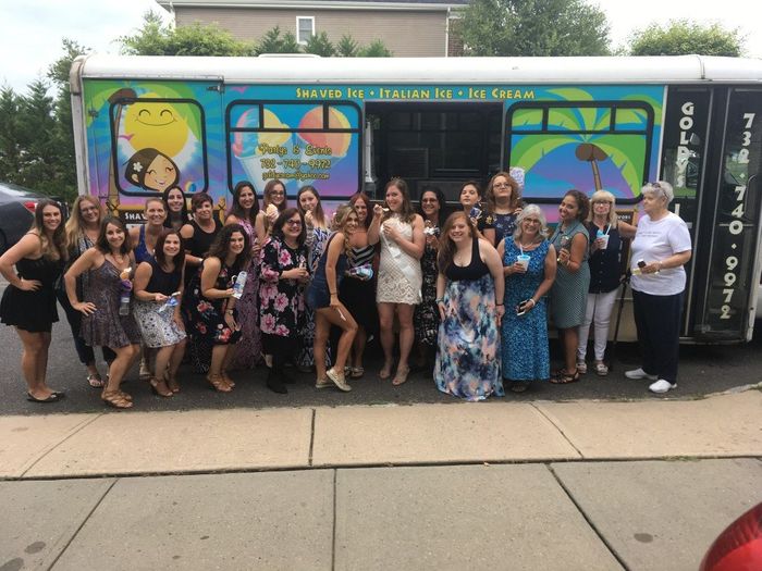 The whole group in front of the ice cream truck