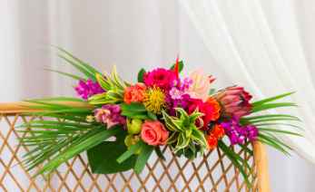 arch/sweetheart table arrangement (but with purple flowers)