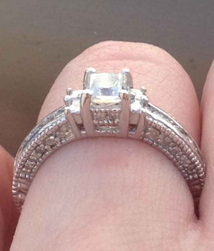 We haven't seen any BLING in a while!  Show off your rings!