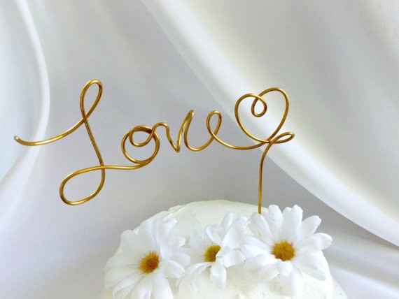 Anyone NOT doing a cake topper?