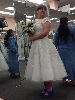 Is your dress WHITE or IVORY?