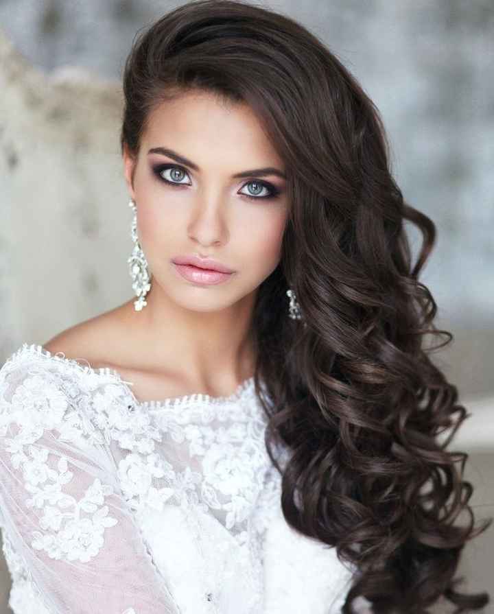 Hairstyle problem!!! I want to show off my back but my guy likes my hair down. Any suggestions???