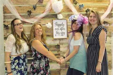 My Aunt wanted to see the sign in the picture so when we stepped apart it looked like my cousin and 
