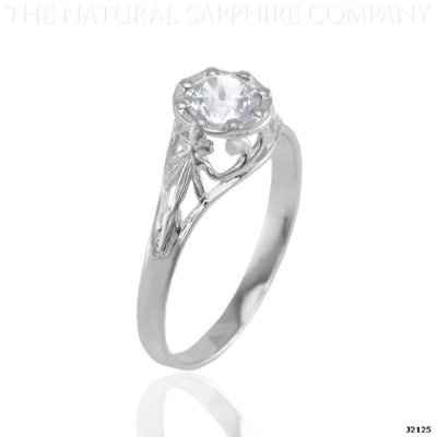 23 small diamonds, and one bigger diamond... I LOVE IT. Lets see some rings my fellow brides.