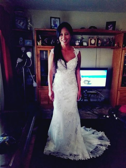 PreOwnedweddingdresses.com