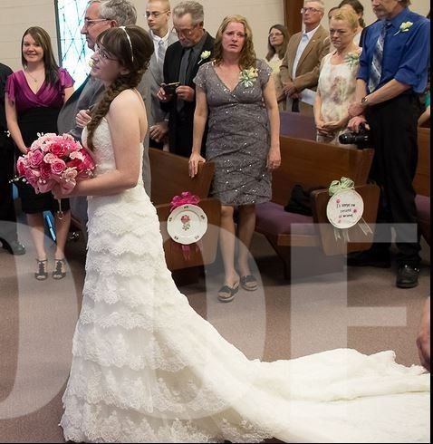 It's a rainy day here on the East Coast, I'm in need of sunshine.  So show me your wedding dress