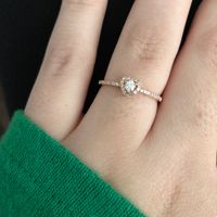 Who has a rose gold ring? - 1