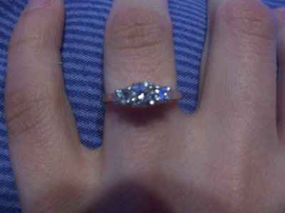 What makes a girl smile again? Dress and Rings:)