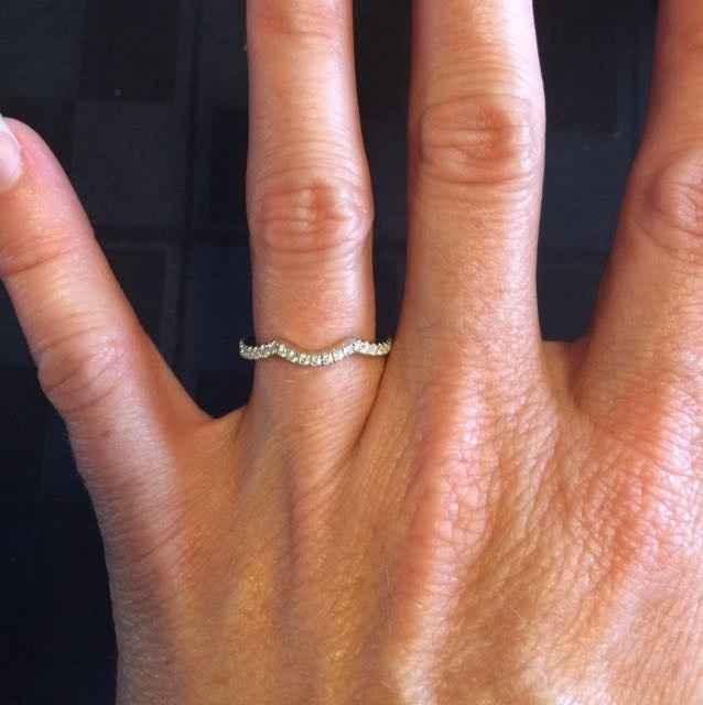 Does anyone have a twisted band diamond engagement ring? And what kind of wedding band did you get?