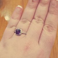 We went a little non-traditional because I'm not a big fan of plain white diamond rings on me.