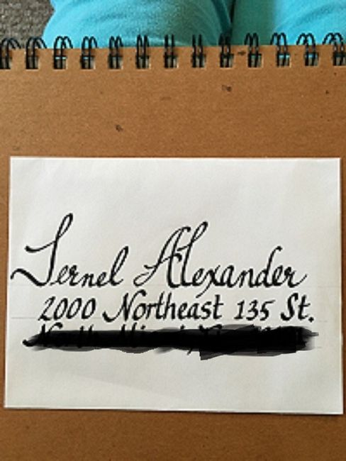 Hand addressing envelopes
