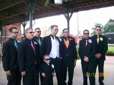 Please help...Groom and GM's attire. Is there a difference in tuxes/dress?