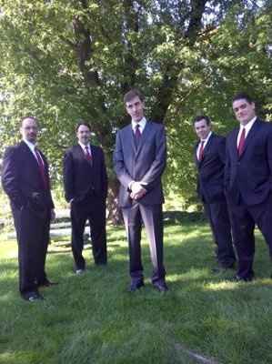 should the groomsmen wear suits or tuxedos?