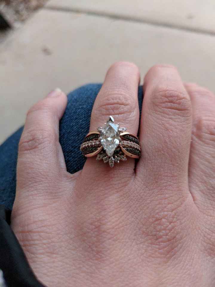 Who has a rose gold ring? - 2