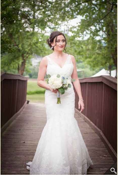 Brides with form fitting dresses