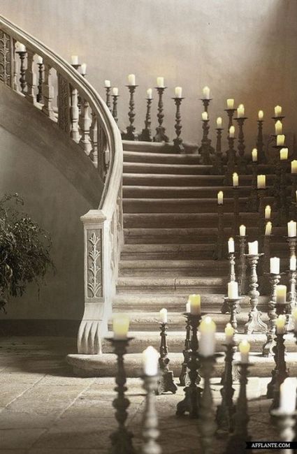 It's either the greenery or a ton of candle stick holders