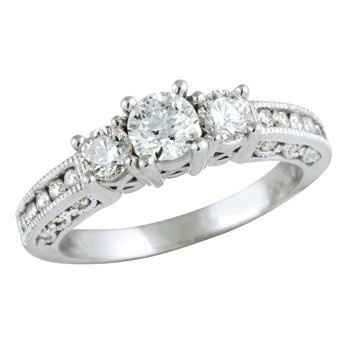 23 small diamonds, and one bigger diamond... I LOVE IT. Lets see some rings my fellow brides.