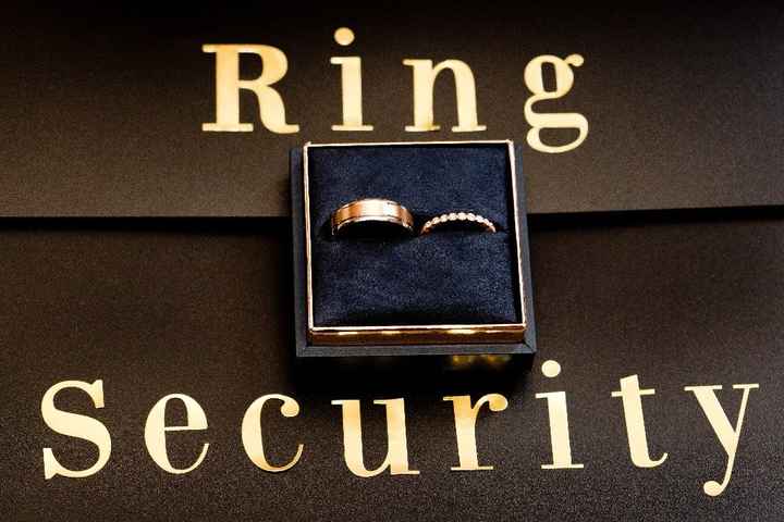 My photographer took our rings and put them on the "ring security" briefcases I made for the ring be
