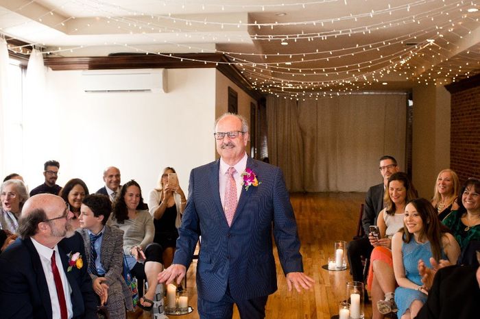 Strutting down the aisle to ABBA's "Take A Chance On Me."
