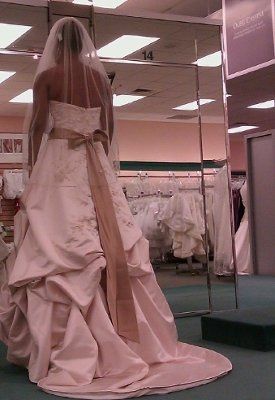 who is wearing a bridal dress orther than White and Ivory