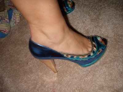 Holy shiny blue heels batman!