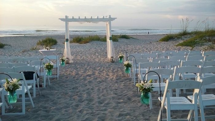 Can I see pics of your aisle/ceremony decor and wedding arbors?