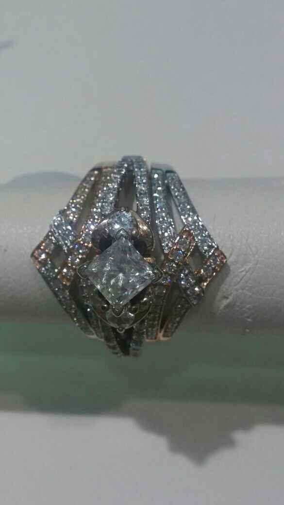 Let's see those rings! And for the Mrs lets see the bands with it ! I LOVE seeing everyone's bling:)