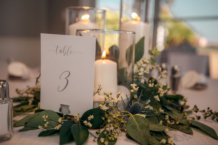 Pillar candles and greenery for centerpieces 2