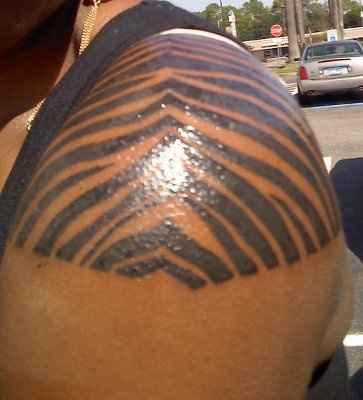 NWR: I got a request from heidi d. about my zebra tattoo