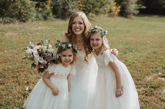 What color does the flower girl wear? - 1