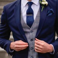 What color groom and groomsmen suits will coordinate with the bridesmaids dresses? - 3