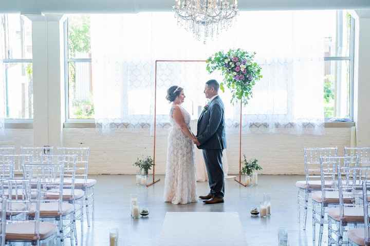 copper arch made from materials at home depot. Taped down aisle runner ourselves. Made succulent arr