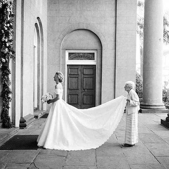 wedding dress with attendant