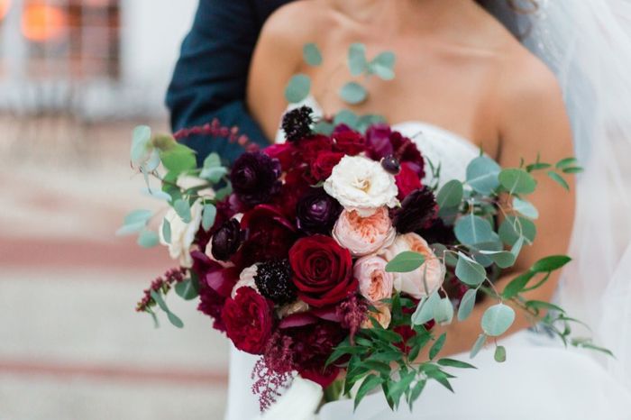 This has a structured central shape but rougher greenery, if you're worried about a cascade bouquet 