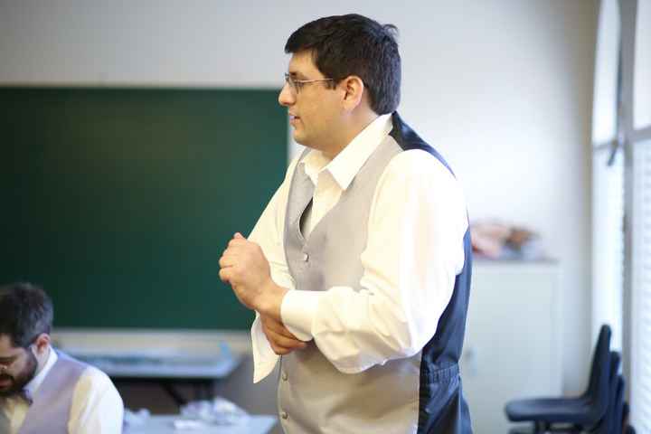 DH getting ready. (AKA how many engineers does it take to figure out how cuff links work?)