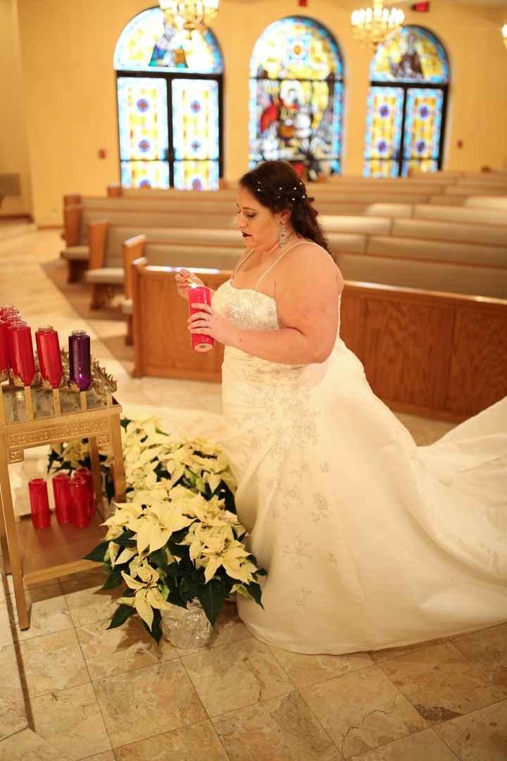 Lighting a candle and saying a prayer for my grandparents before the ceremony.