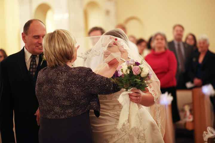 I'm so glad I had my mom flip back my veil. 