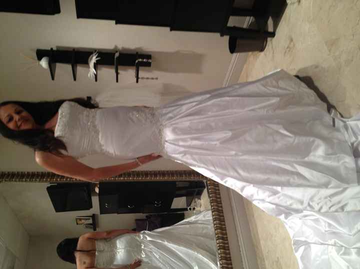 So today I got to try on my dress.... and...