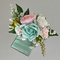 Can anyone help me? Can’t decide between these two boutonnieres - 3