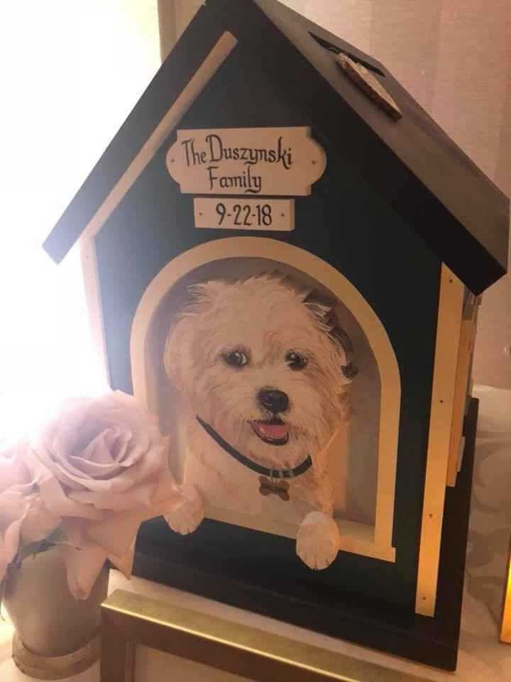 We had our dog hand painted onto a card box.  He was with us, even if he didn't make the guest list!
