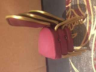 Venue Chairs are Maroon w/ Gold Trim, will they match my Plum & Gold wedding?