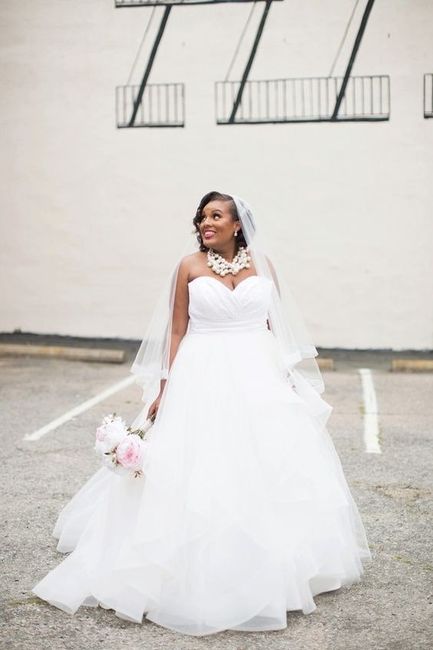 A floor length dress (with or without a train):