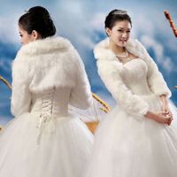 Soft Ivory Dress: Should I get a white or ivory fur bolero?